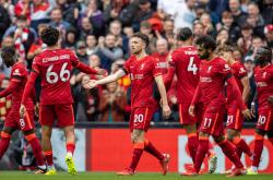 爱游戏官方入口-利物浦豪取胜利，球队士气高昂